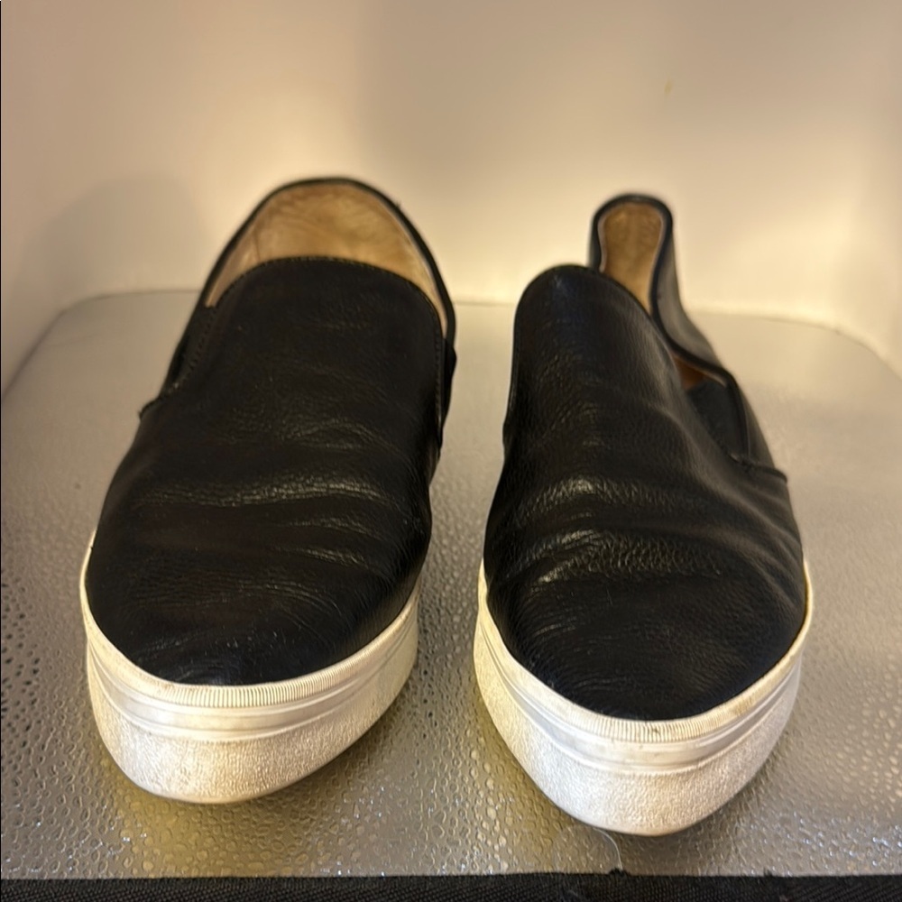 Black and White Slip-On Loafers with Minimalist Design​